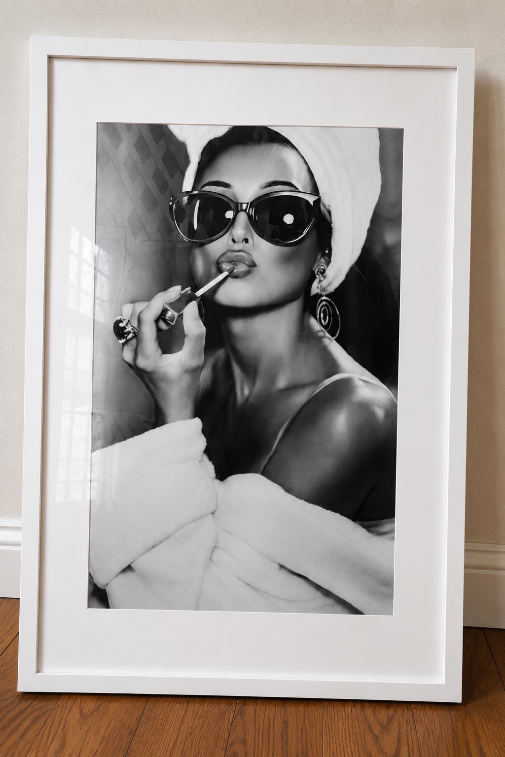 Black-and-White Woman Applying Lipstick Photograph